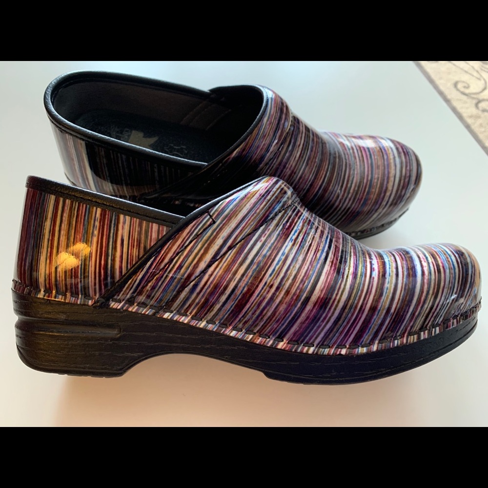 Dansko clogs with multi color stripes